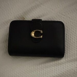 Elegant Black Wallet with Gold Accent